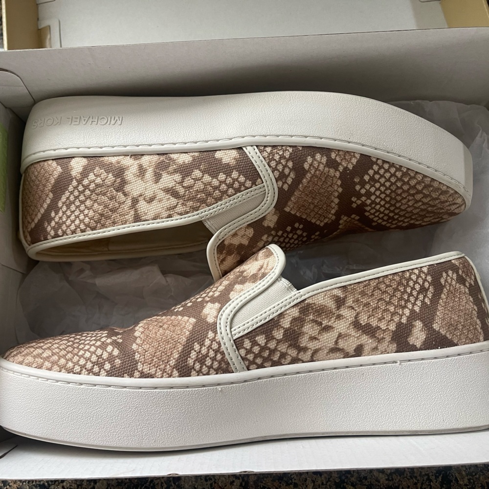 Michael Kors Teddy slip on heavy canvas shoes.